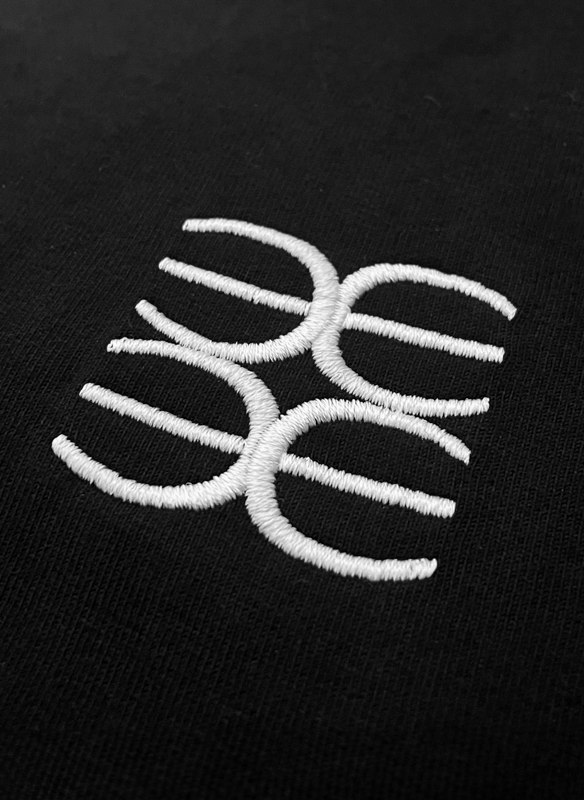 Oversized Black Embroided Anagram T-shirt - MARCUS ELIZABETH - T-shirts